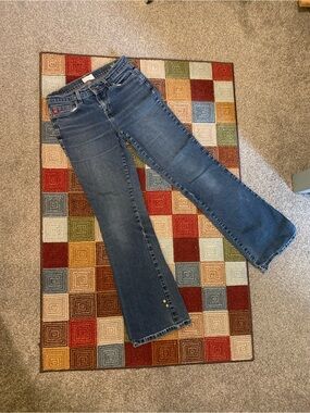 Mid rise flare leg blue jeans